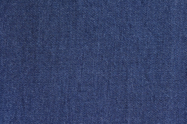 Texture de jeans bleus ou textile denim d'arrière-plan