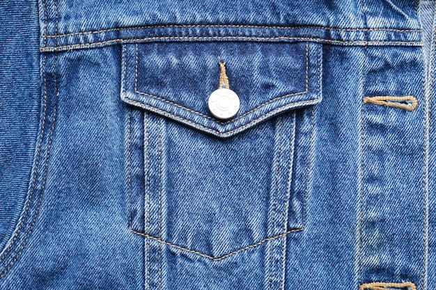 Texture de jeans classique, gros plan. Veste en jean bleu, jean.