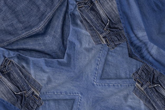 Texture de jeans en denim bleu traditionnel minable