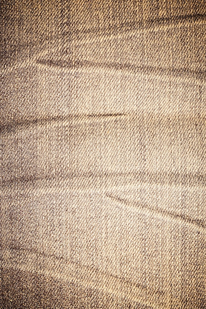 Photo texture de jeans en denim déchiré sale.