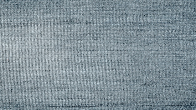 Texture de jeans en denim. Texture de fond de denim pour la conception. Texture de jeans bleu pour le fond.