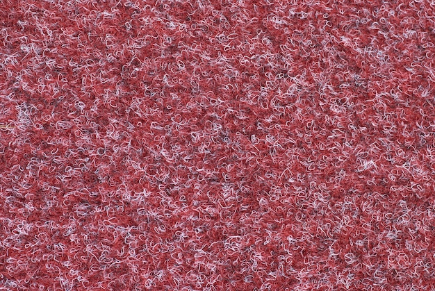 La texture de laine rouge peut être utilisée pour la surface