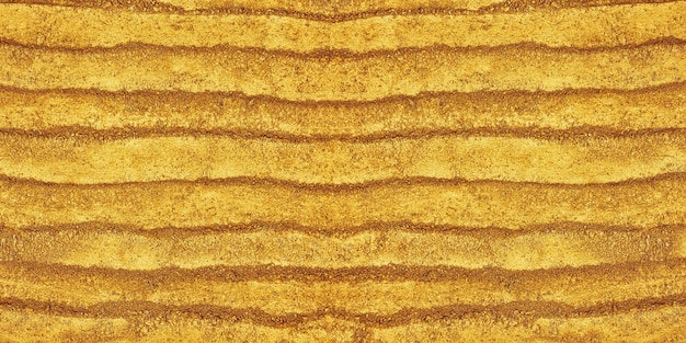 Texture large de poudre d'or. Écran large de la poussière de sable de couleur dorée la