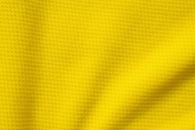 Texture de maillot de maillot de football de tissu de vêtements de sport jaune bouchent