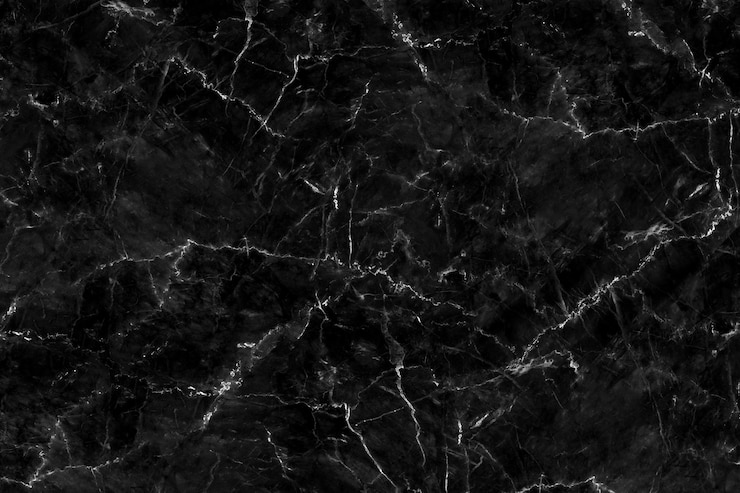 Photo texture de marbre noir naturel pour le papier peint de carreaux de peau