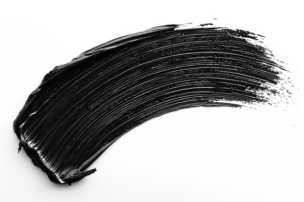 Photo texture de mascara noir isolée sur fond blanc échantillon de produit cosmétique