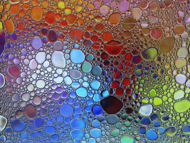 Texture mélangée abstraite de bulles de savon à l'huile d'eau multicolore