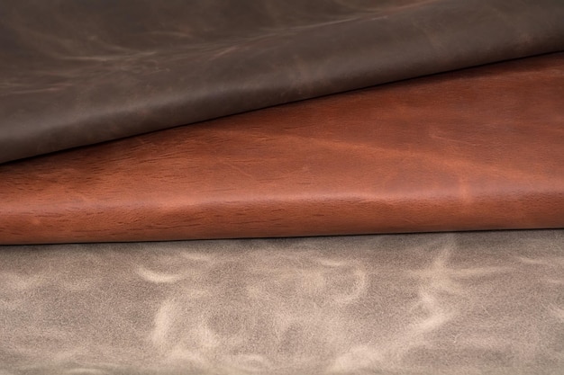 Texture des morceaux de cuir marron Fond de matériau naturel