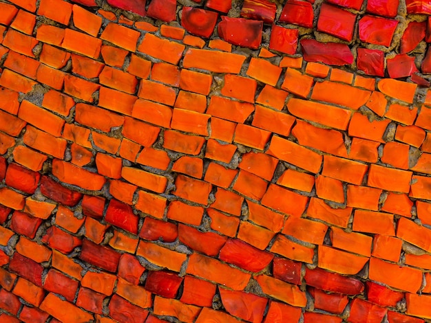 Texture de mosaïque de pierre rouge et orange