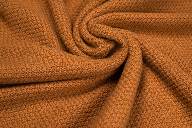 Texture de motif de tissu tricoté marron