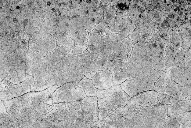 Texture d'un mur de béton avec fond de fissures et rayures