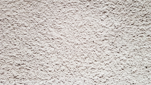 Texture de mur en béton. Fond de mur en stuc blanc. Mur de ciment peint en blanc. Mur et sol en béton blanc comme texture de fond. Loft dans le style des idées de conception d'un immeuble résidentiel.