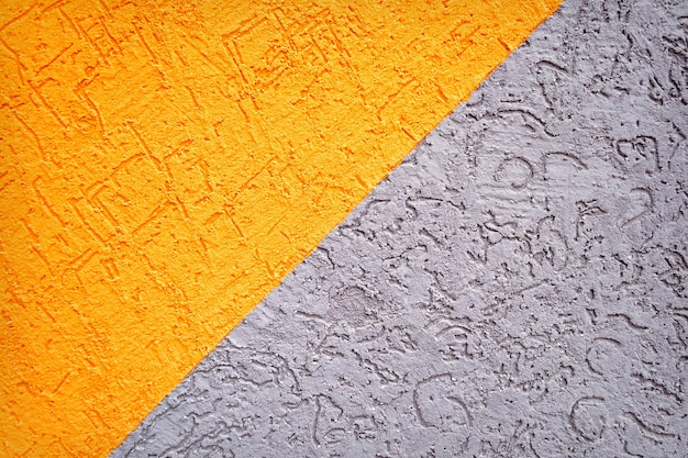 Texture de mur de béton gris et orange