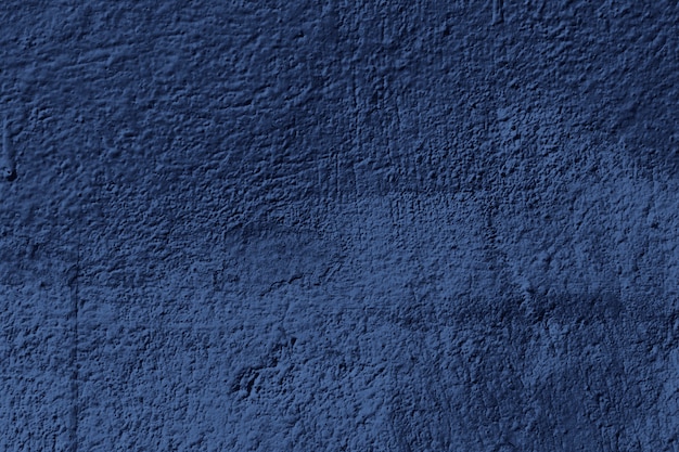 Texture de mur en béton grunge bleu fond