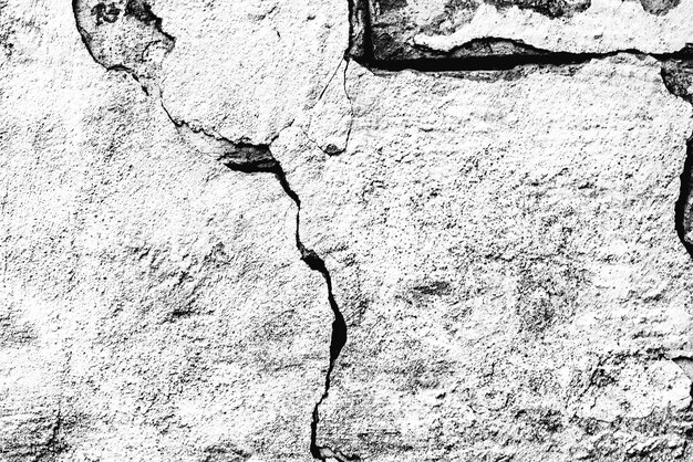 Texture, mur, béton, il peut être utilisé comme arrière-plan. Fragment de mur avec des rayures et des fissures