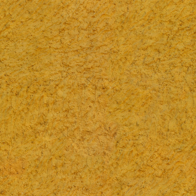 Texture de mur de béton jaune