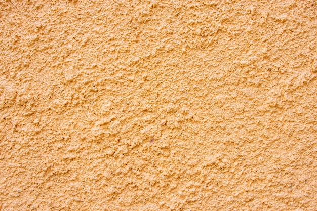 Texture de mur de béton orange