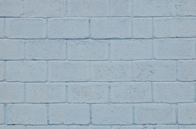 Texture de mur en blocs de couleur bleue patinée et teintée