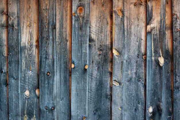 Texture de mur en bois ancien gris et jaune