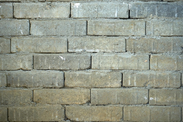 Texture de mur de brique gris