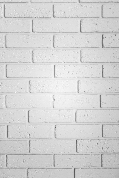 Texture de mur de brique, gros plan. Papier peint texturé blanc vertical