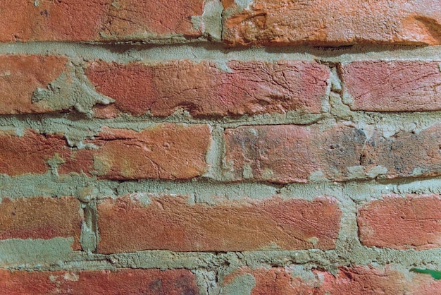 Texture de mur de brique orange. vieux mur de briques
