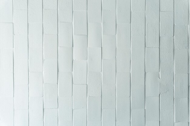 Texture de mur de briques blanches pour l'espace de copie de fond de modèle