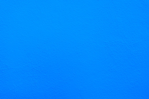 Texture de mur de ciment ou de béton bleu pour le fond.