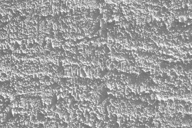 Texture de mur de ciment blanc avec un motif naturel pour le fond