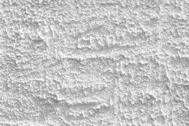 Texture de mur de ciment blanc avec un motif naturel pour le fond