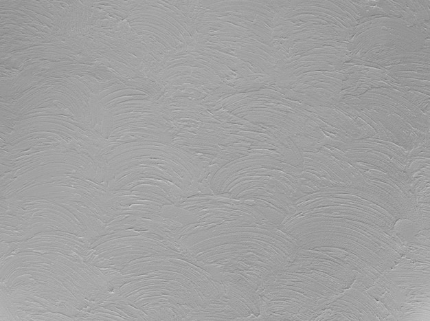 Texture de mur de ciment gris pour le fond.