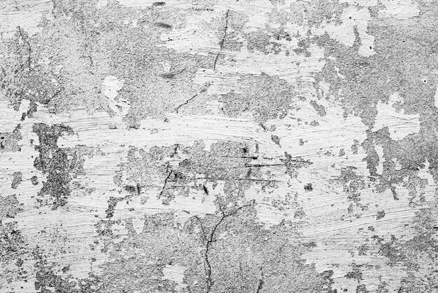 Texture, mur, fond de béton. Fragment de mur avec rayures et fissures