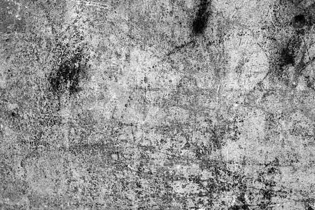 Texture, mur, fond en béton. Fragment de mur avec rayures et fissures