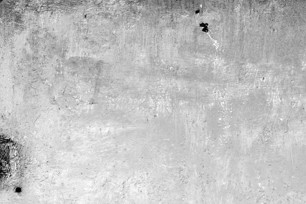 Texture, mur, fond en béton. Fragment de mur avec rayures et fissures