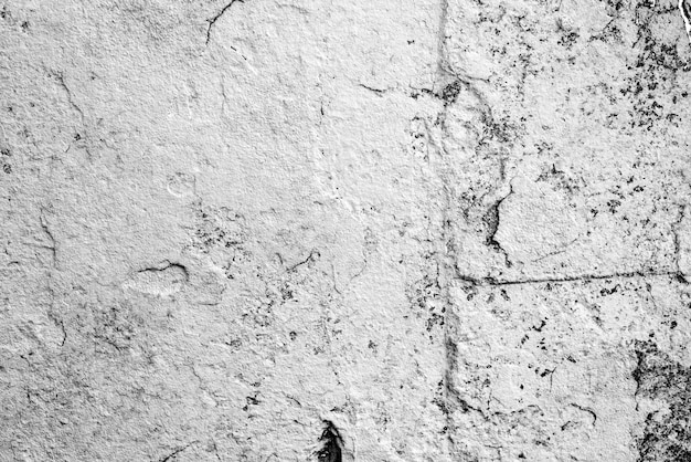 Texture, mur, fond en béton. Fragment de mur avec rayures et fissures