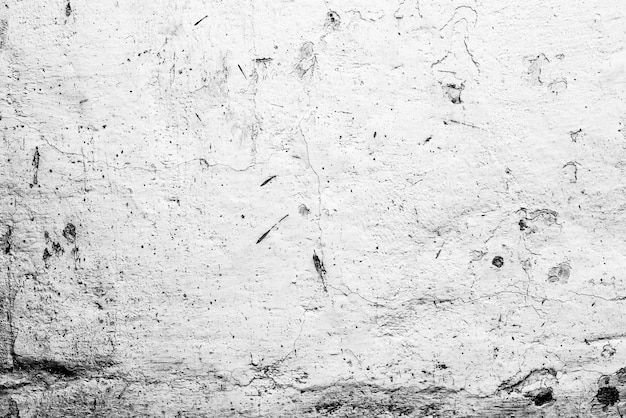 Texture, mur, fond en béton. Fragment de mur avec rayures et fissures