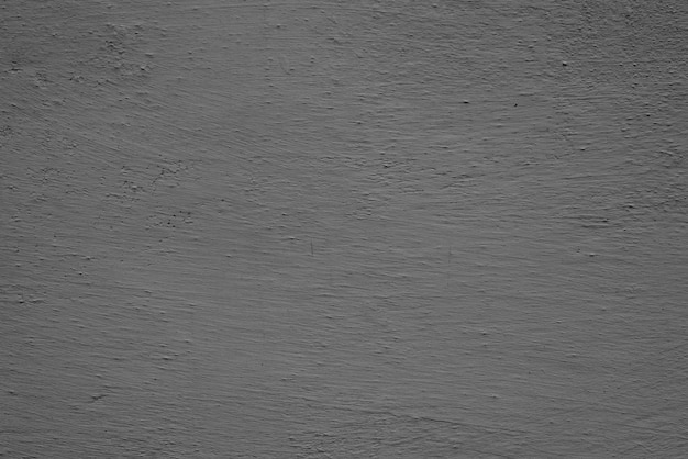 Texture, mur, fond en béton. Fragment de mur avec rayures et fissures