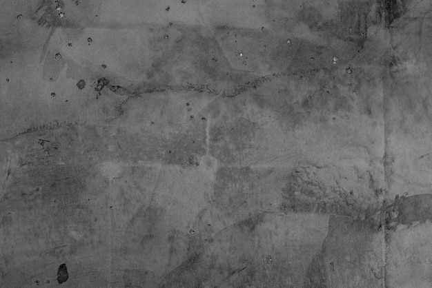 Texture, mur, fond en béton. Fragment de mur avec rayures et fissures