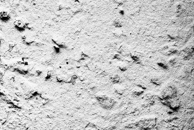 Texture, mur, fond en béton. Fragment de mur avec rayures et fissures