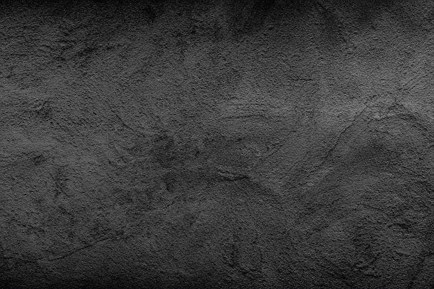 Photo texture de mur noir audacieux un arrière-plan frappant et texturé