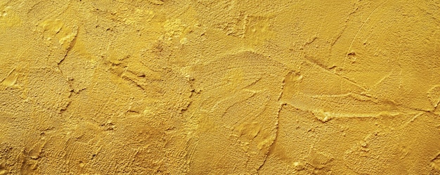 Texture de mur d'or fond rugueux sol en béton abstrait ou vieux fond grunge de ciment avec de l'or vide.