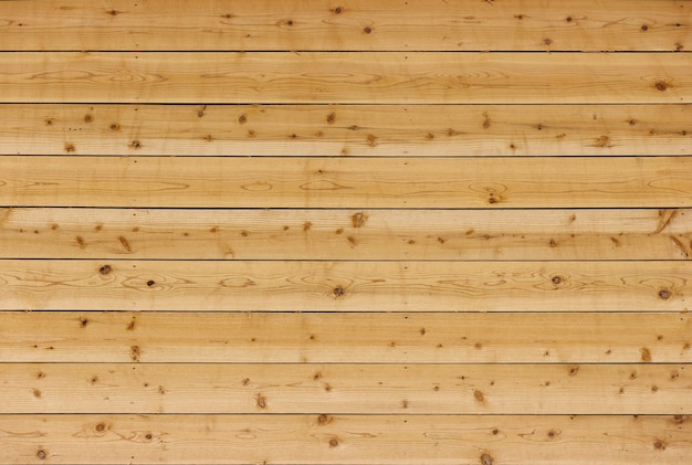Texture de mur de panneaux de bois brun horizontal.