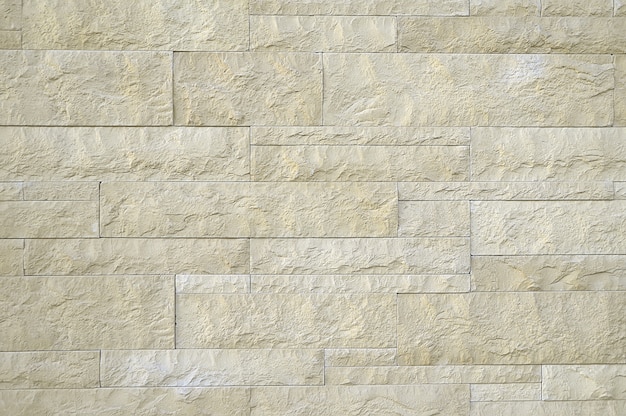 Texture de mur en pierre beige ancien