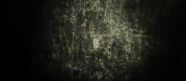 Texture de mur sombre effrayant pour le ciment de fond plein de taches et d'égratignures