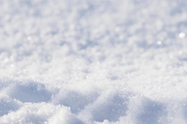 Texture de neige blanche fond d'hiver naturel avec de la neige