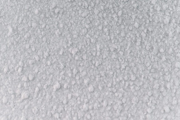 Texture de neige blanche. ressources de conception. glace gelée recouverte de neige