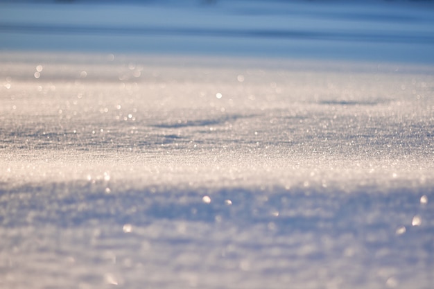 Texture de neige brille dans le motif du soleil. Noël, nouvel an