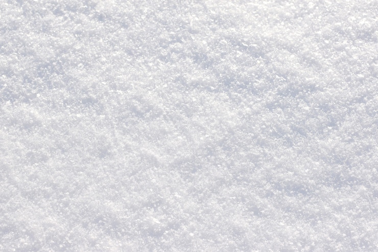 Photo texture de neige. terre couverte de neige. flou artistique.