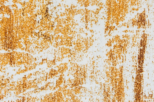 Texture orange rouillée sur le mur.