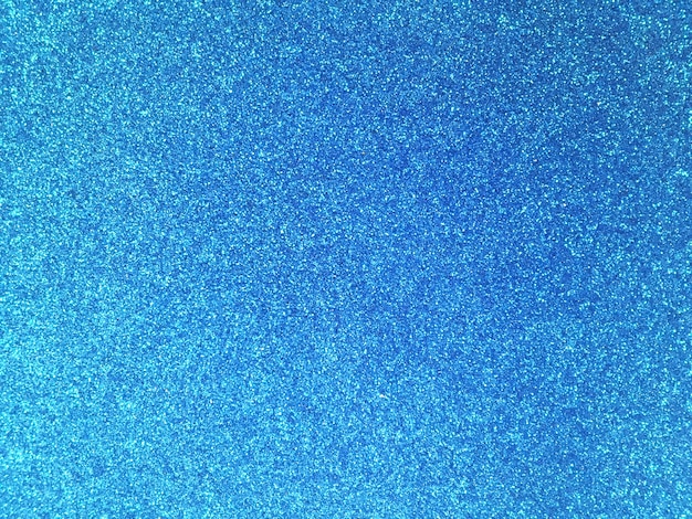 Texture de paillettes bleu abstrait de Noël.